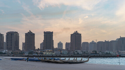 Doha, Qatar - March 03,2022 :Beautiful Katara beach during the early morning with mist in the background.