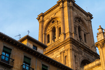 Fototapeta na wymiar Low-angle view of the facade of the Cathedral of Granada in Spain during sunset