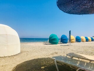 beach umbrellas on a beach. Kos