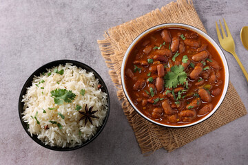 Kidney bean curry or rajma or rajmah chawal and rice roti, typical north Indian food main course....