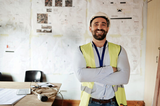 Engineer, technician or construction worker happy for working in office for construction, architecture and building project. Portrait of a manager with smile for vision, goal and career in engineerin
