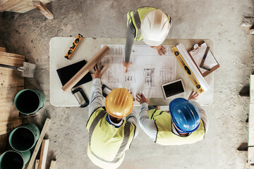 Top view, construction workers or blueprint planning in house, home or office building in real estate, property or architecture innovation. Men, engineering woman or construction site people or ideas - obrazy, fototapety, plakaty