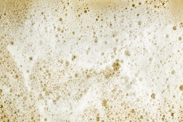 soap foam on beige foch texture background backdrop