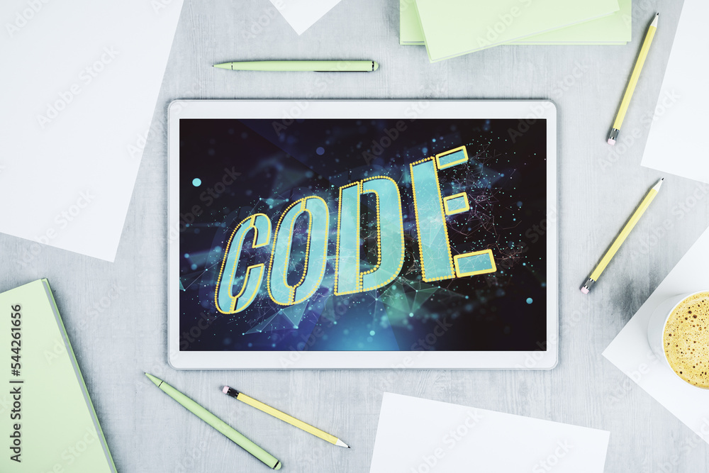 Leinwandbilder Creative Code word sign on modern digital tablet display, international software development concept. Top view. 3D Rendering