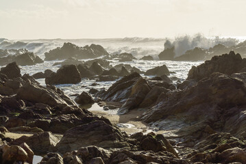 Rocks of Atlantic Ocean seen from beach in Porto, Portugal