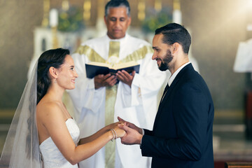 Couple getting married, wedding vows and love commitment at the alter of church during marriage...