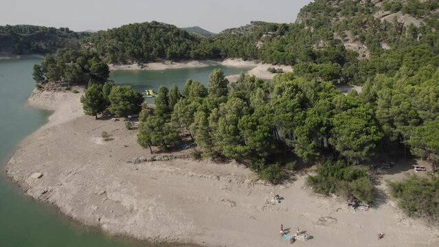 Aerial view of Lakes at El Chorro, close to the village of Ardales, Spain turquoise water reservoirs or &lsquo;Embalses. Lagos de M&aacute;laga featuring Gaitanejo reservoir, near the Royal El Chorro Royal Trail