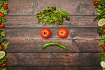 Healthy food concept. Various organic vegetables on rustic wood background. Flat lay, top view with space for text