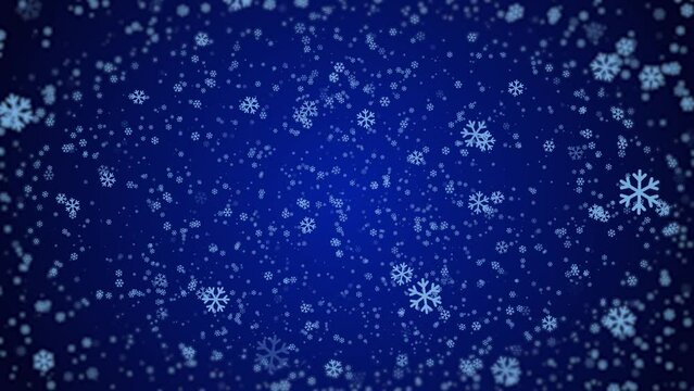 Many white snowflakes are falling down on a dark blue background