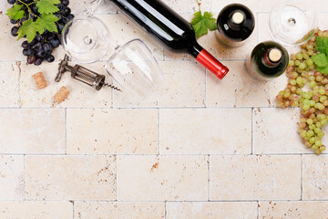 Wine glasses, bottles and grapes