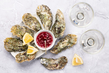 Fresh oysters with glasses of sparkling wine