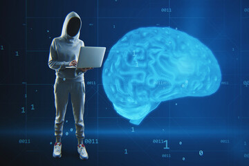 Abstract image of hacker with laptop computer and creative blue brain hologram on blurry...