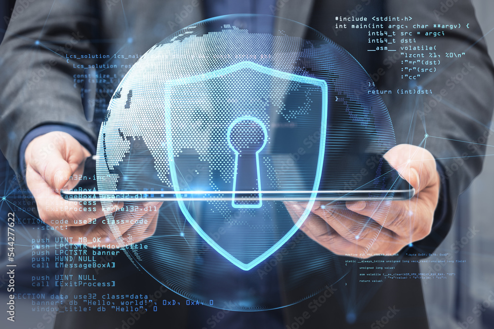 Poster Close up of businessman hands holding pad with abstract safety hologram with globe and coding on blurry background. Secure, protection and web concept. Double exposure.