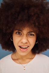 Black woman, afro or confused face on studio background with question, crazy gossip or fake news....