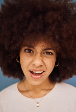 Black woman, afro or confused face on studio background with question, crazy gossip or fake news. Zoom, portrait or thinking model and doubt expression, huh or what facial expression at scam or fraud