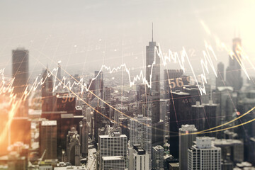 Naklejka premium Abstract virtual financial graph hologram on Chicago skyline background, forex and investment concept. Multiexposure
