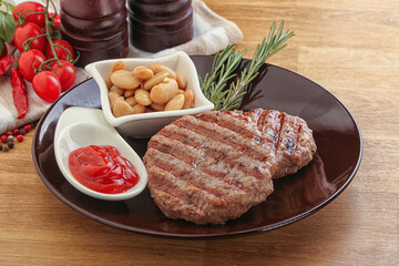 Grilled beef burger cutlet with sauce