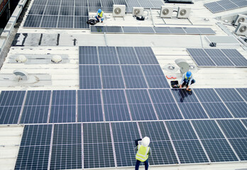 Grid, solar energy and roof construction engineering people working on renewable energy...