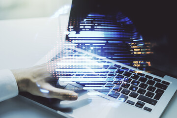 Multi exposure of abstract software development hologram with world map and hands typing on computer keyboard on background, global research and analytics concept