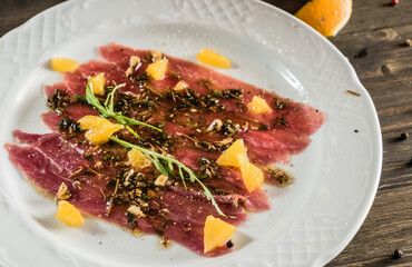 duck carpaccio with orange and pesto