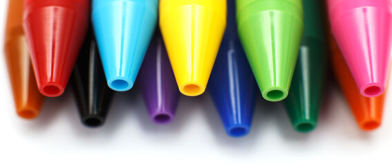 Multicolored gel pens isolated on a white background, close-up. Copy space. banner