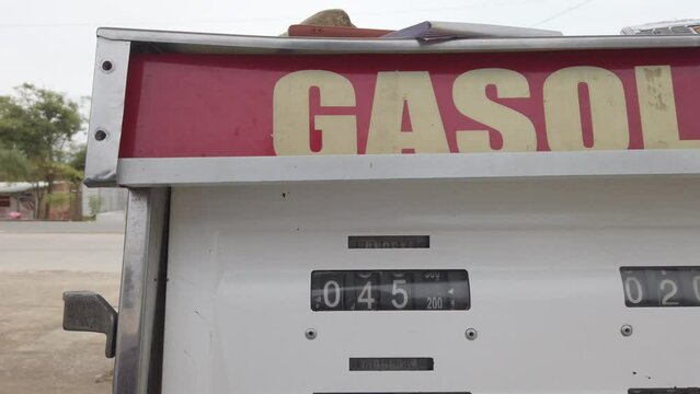 COLOMBIA OSMO 2Uribia 2022 , old antique gasoline station in South America Colombia - vintage gas pump refuels gasoline