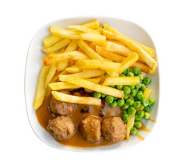 Meatballs with French Fries, Green Peas, Bechamel Sauce on White Plate