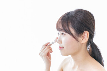 Fototapeta premium お化粧をする女性