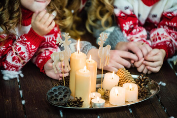 Chrismtas time, family near Christmas table