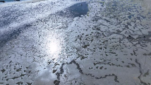 Collecting clams in Costa Nova. Panoramic view of the Ria de Aveiro on the Atlantic coast of Portugal. Aerial view from a drone. Portugal. Europe