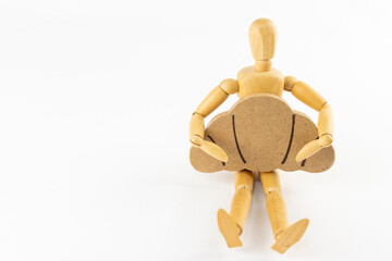 デッサン人形と木製オモチャのクロワッサン