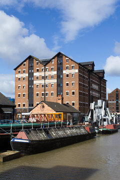 Gloucester, UK - 24th August 2010: A refurbished old Victorian warehouse building in historic Gloucester Docks houses the National Waterways Museum.