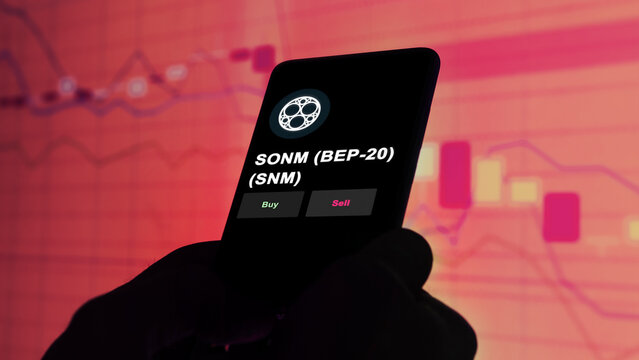 November 3th 2022, Berlin. An investor's analyzing the SONM token 'BEP-20' token 'SNM' coin on screen. A phone shows the sonm crypto's prices to invest
