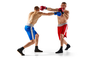 Fototapeta na wymiar Two twins brothers, professional boxers in blue and red sportswear boxing isolated on white background. Concept of sport, competition, training, energy.
