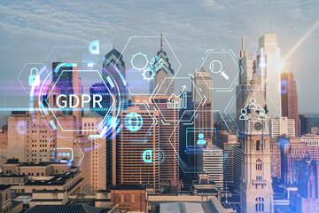 Aerial panoramic cityscape of Philadelphia financial downtown, USA. City Hall Clock Tower at sunrise. GDPR hologram, concept of data protection regulation and privacy for all individuals in EU Area