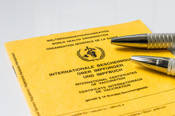 international vaccination certificate from the World Health Organization. Yellow vaccination book...