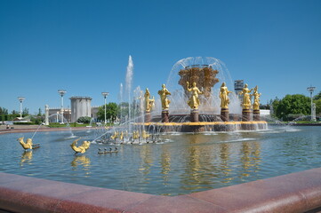 Moscow, Russia - June 8, 2022: Fountain "Friendship of Peoples" on a sunny summer day at VDNH