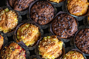 Chocolate and hazelnut muffins. American cuisine delicacies. Top view