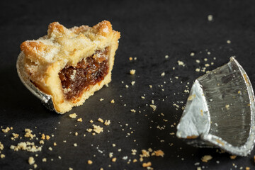 one halved christmas mince pie closeup