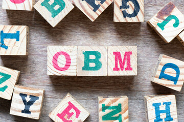 Alphabet letter block in word OBM (Abbreviation of Original brand manufacturer) and another letter...