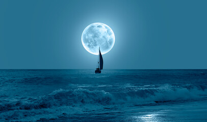 Lone yacht with Super Full Moon 