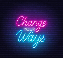 Change Your Ways neon quote on brick wall background.