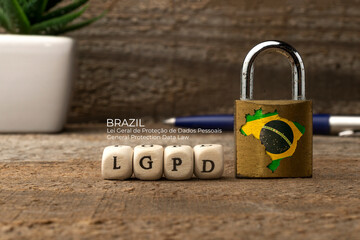 LGPD (brazilian data protection law) concept: lock with brazil flag and some die with the acronym...