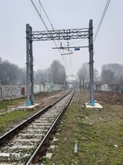 support trellis of railway cables on a bad winter day 