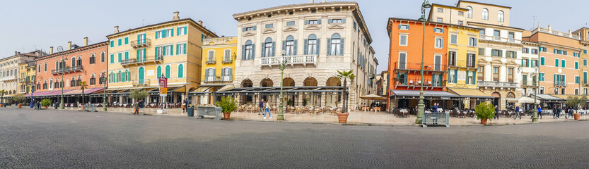 Fototapeta na wymiar Extra wide view of The beautiful Square Brà in Verona with houses with colored facades