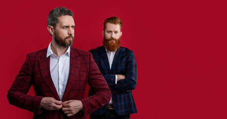 bearded men in formalwear, copy space. elegant men wearing formalwear. studio shot