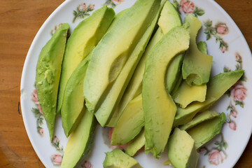 Green ripe sliced palta avocado guacamole raw fresh vegetable food