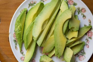 Green ripe sliced palta avocado guacamole raw fresh vegetable food