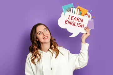 Fotobehang student girl holding speech bubble with text learn english and illustration isolated on lilac background © Evgenia