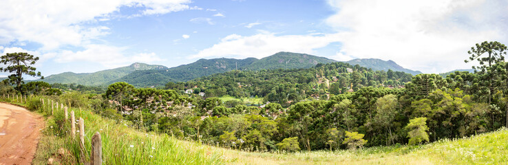 Fototapeta na wymiar Panoramic view of the village of Monte Verde, Minas Gerais. Village with mountains and nature adventure trails and events.